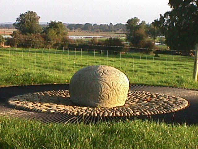 Castlestrange Stone with the River Suck in the background