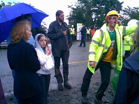 EU MEP Cathy Sinott observes the tug of war over the gates allowing dirt trucks in and out of site