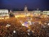 About 20,000 young people angry over high unemployment have spent the night camping in a famous square in Madrid as political protest grows.