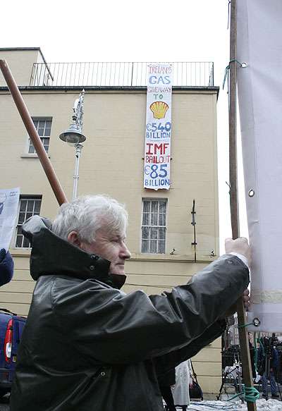 Banner dropped from roof of Buswells Hotel